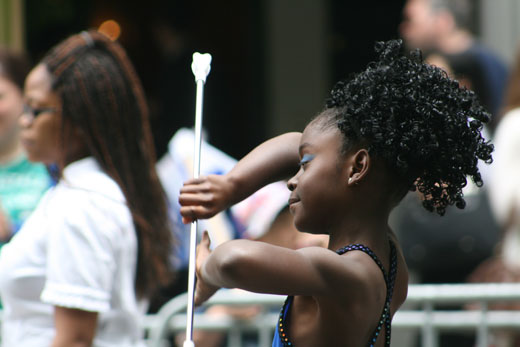 marching girl in New York City