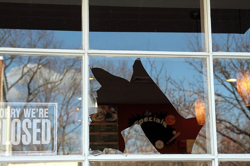 smashed window in Highland Park, New Jersey