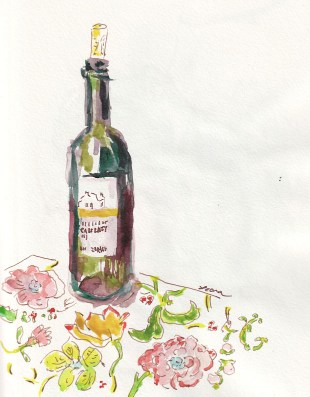 bottle of wine by paisley tablecloth