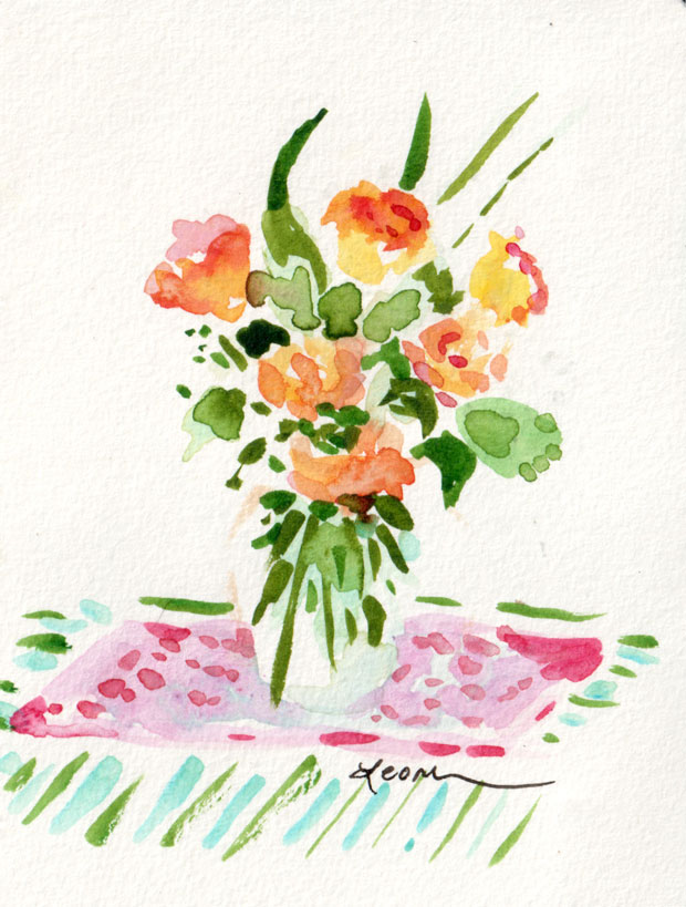 Mother's Day Bouquet: orange roses on a pink placemat on a striped cloth