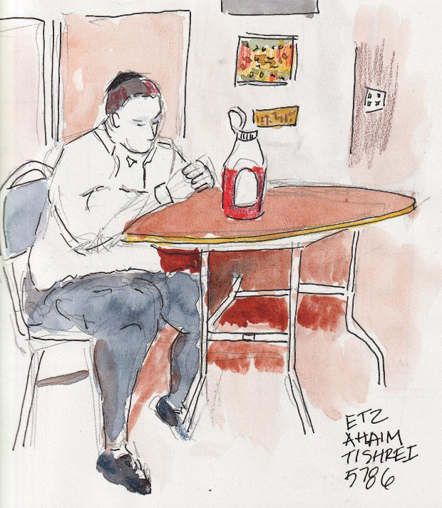 Yeshiva bochur at a table finished eating