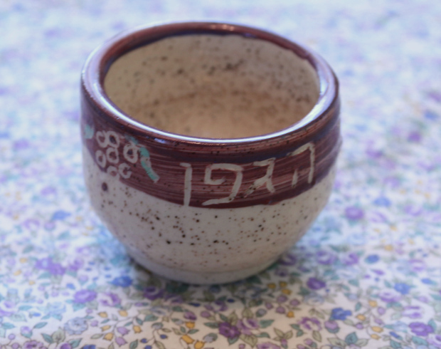 kiddush cup with borei pri hagefen, pottery with slip decoration