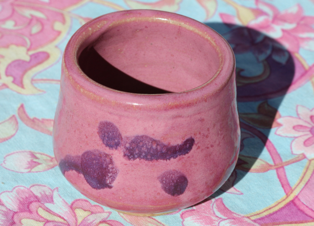 pink glazed pot with purple strokes