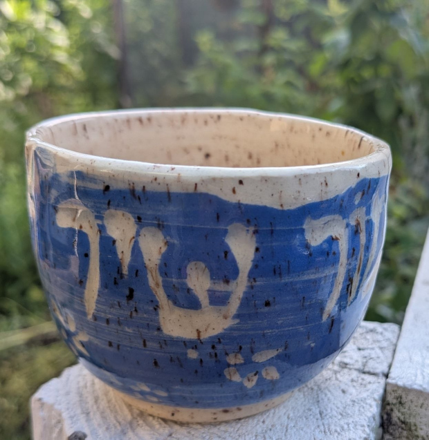 Cup with blue slip, speckled clay. A psalm, a song for the Sabbath day. Mizmor shir l'yom haShabbat. Psalms 92:1