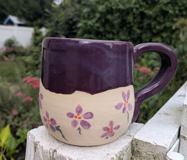 Purple mug with violet flowers