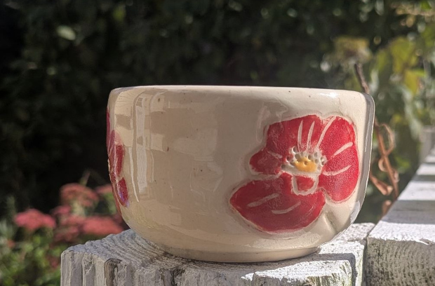 Poppies cup. Red and orange underglaze on white clay.