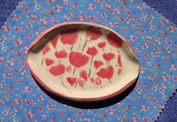 Pink flowers dish. Pink and green underglazes.